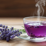 Steaming cup of lavender tea with fresh sprigs